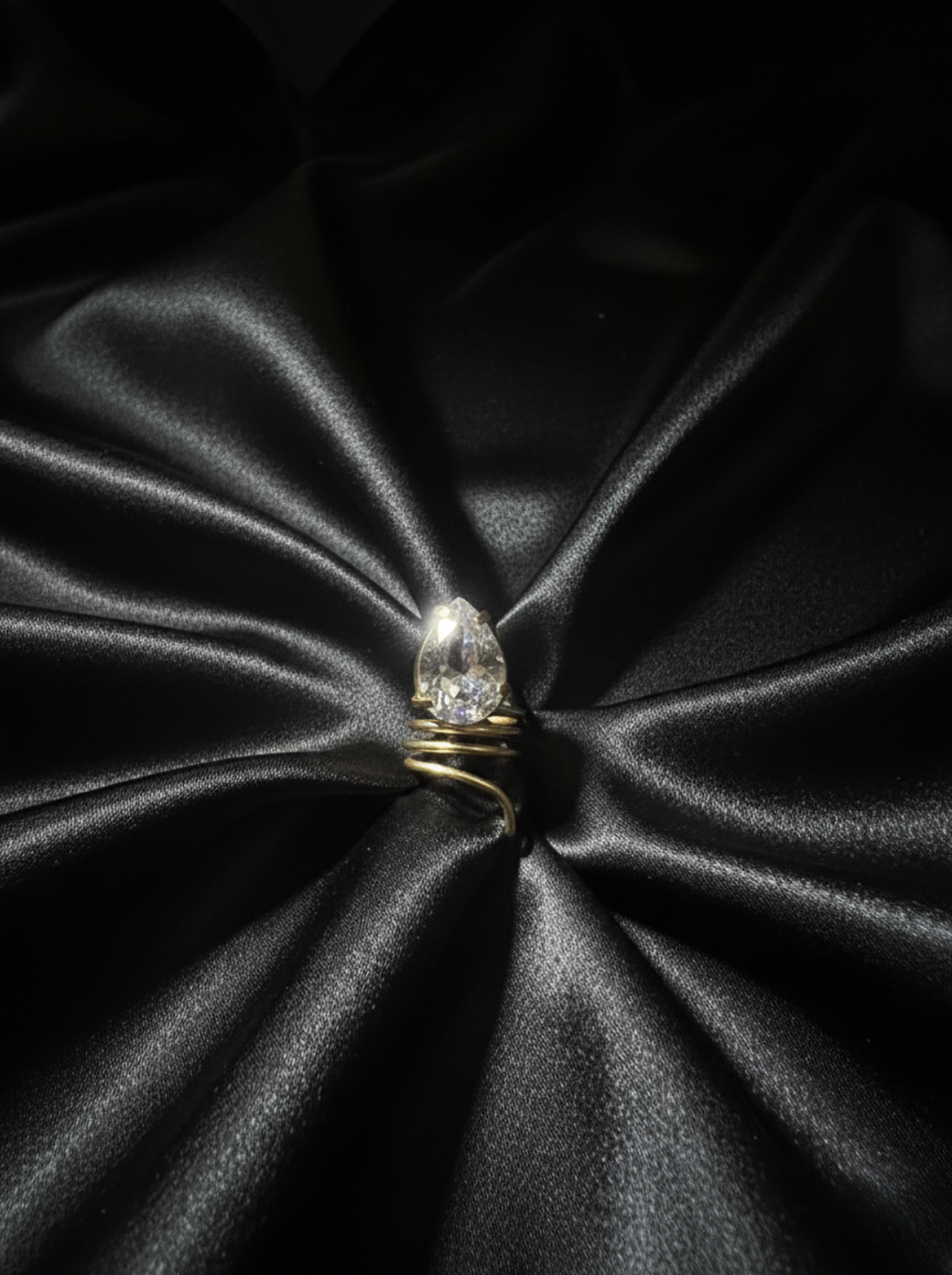 The "Serpent Sparkle" Handcrafted Spiral Ring – Pear-Cut Crystal Wrap Statement Piece