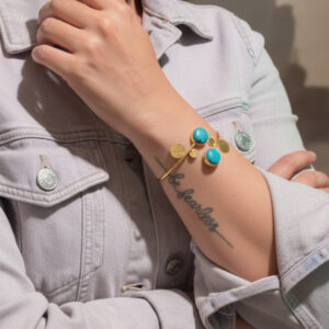 Handcrafted Orbital Turquoise Bypass Bangle in Gold Plated Silver