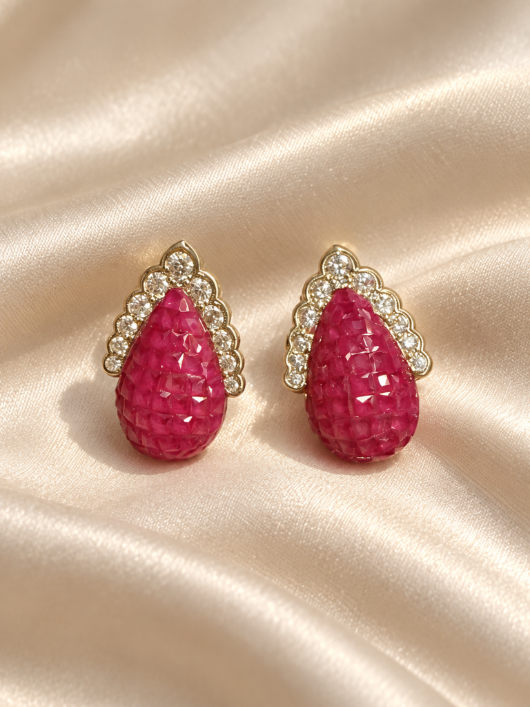 Fuchsia textured teardrop crystal earrings with scalloped clear stone borders
